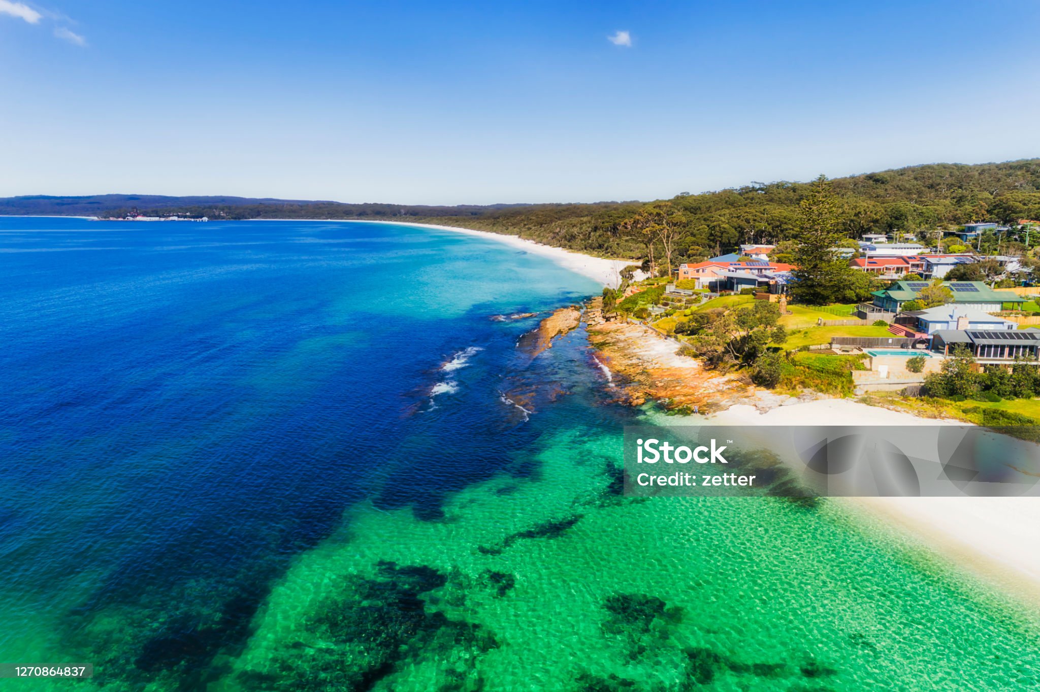 Hyams Beach with white sand beaches and town waterfront